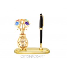 Pildspalvas paliknis ar ziedu vāzi un pildspalvu